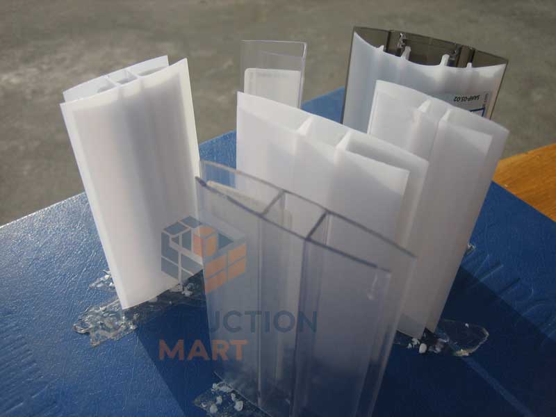 Assorted Constructionmart polycarbonate H connector profiles including plastic joiners, lock-up and clip-on types in various styles and finishes.