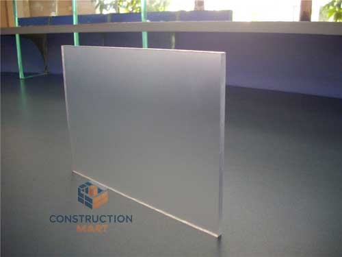 Thick frosted polycarbonate sheet standing on a desk, showing fine matte texture under natural light, suitable for retail or exhibition display cases.